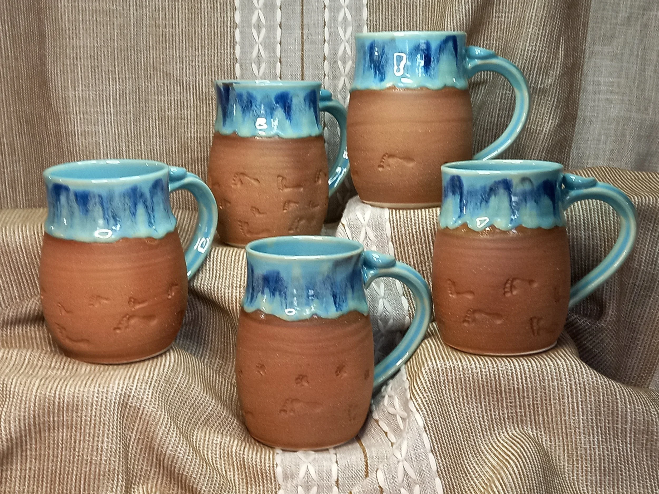 footprint and pawprint pottery mugs, walk on the beach