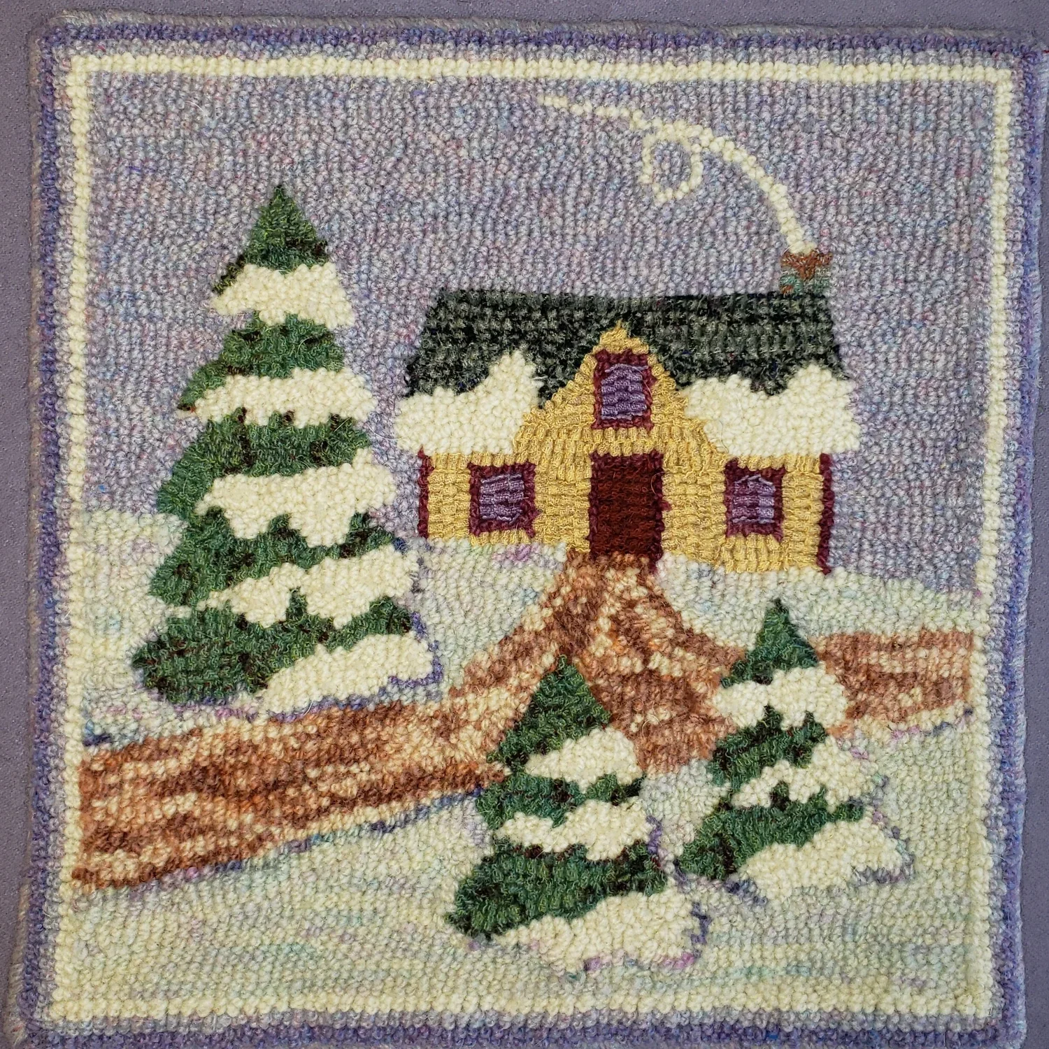 winter scene with yellow house