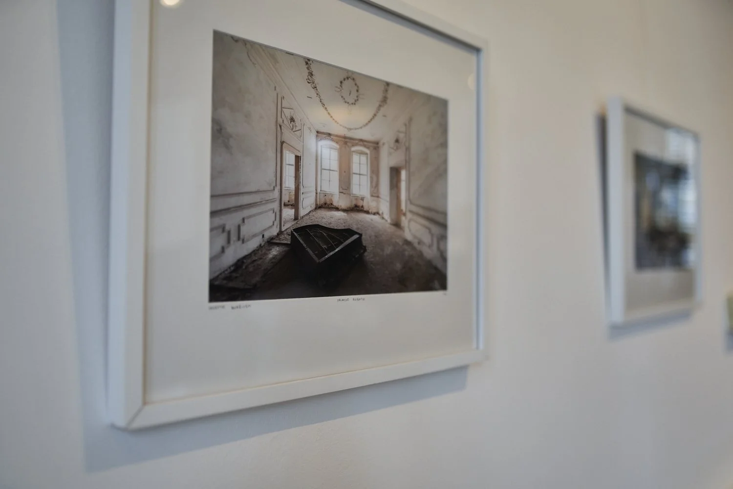 Framed architectural artwork displayed in the Van Essen Attorneys office interior in Amsterdam