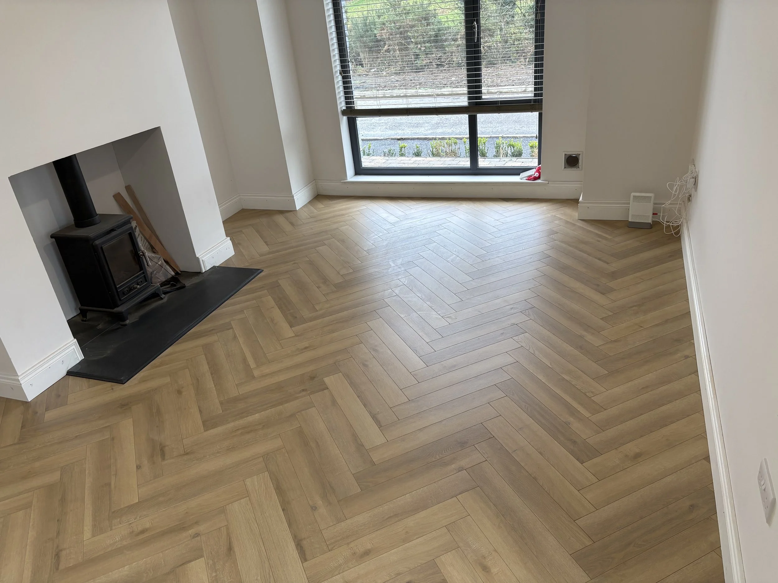 Antrim Living Room Herringbone Laminate After 1.jpeg