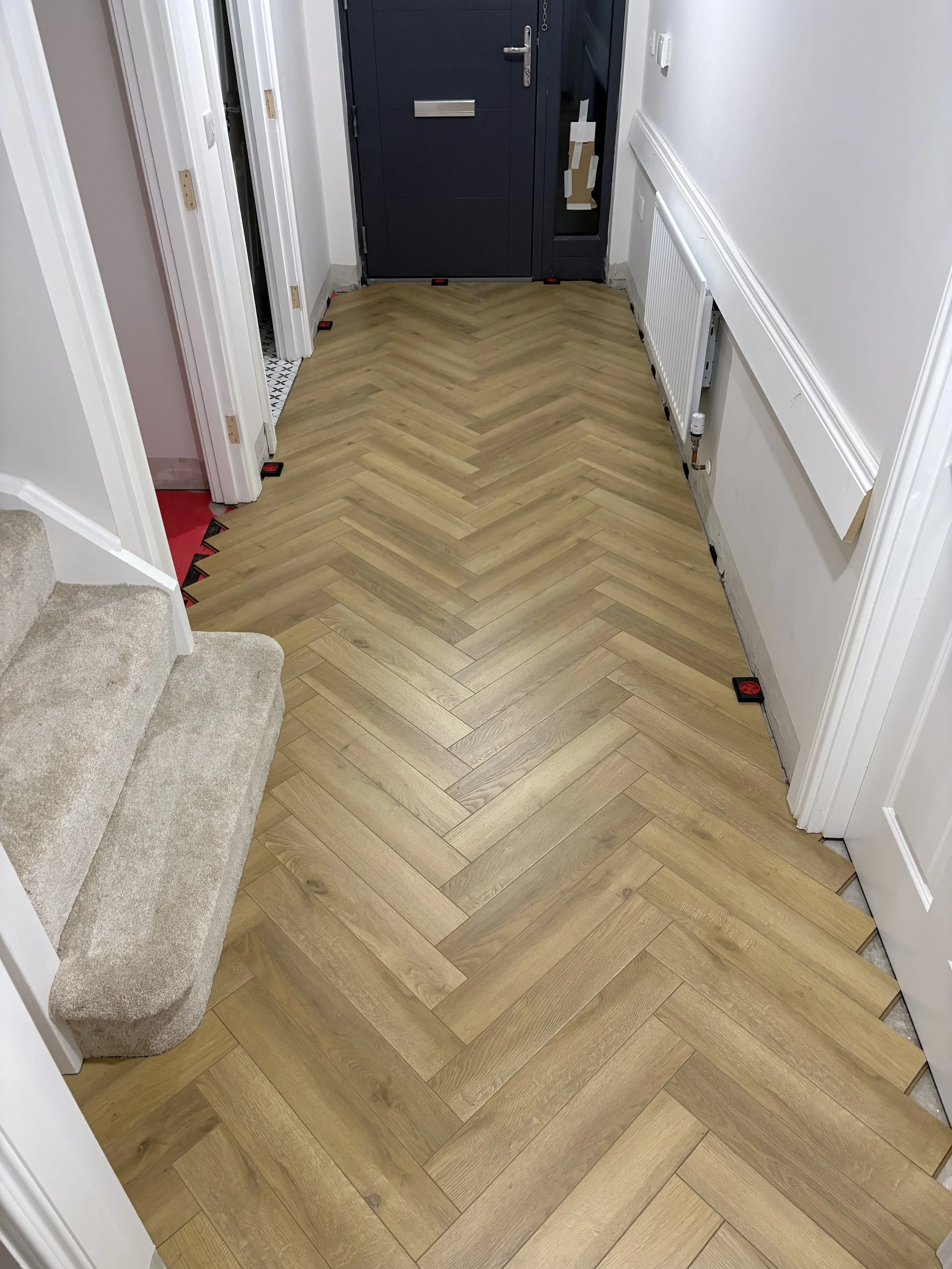 Antrim Hallway Herringbone Laminate After 1.jpeg