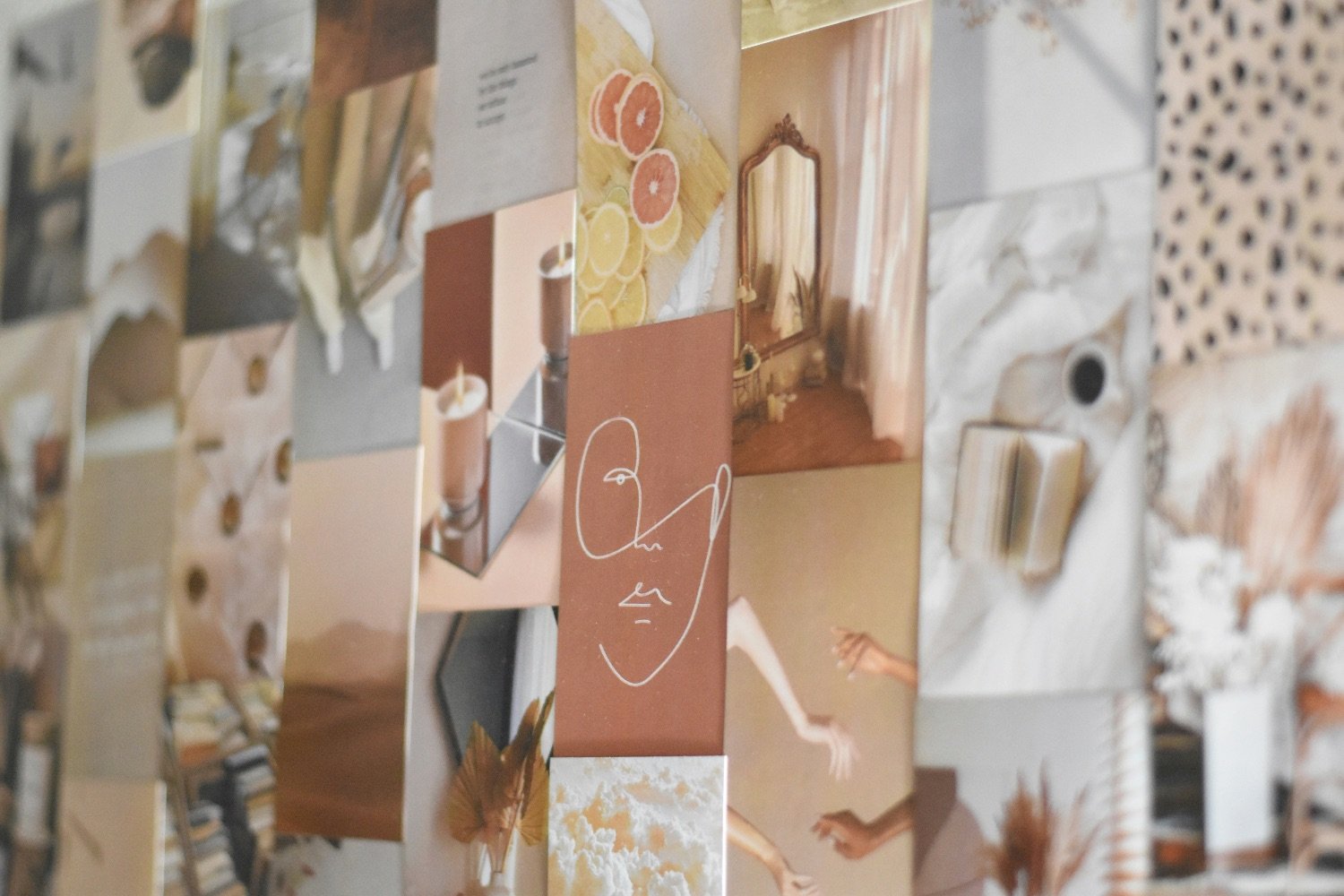 Collage of various photographs including a woman with sketch of a face, a wooden mirror, and abstract art with hands, in warm tones.