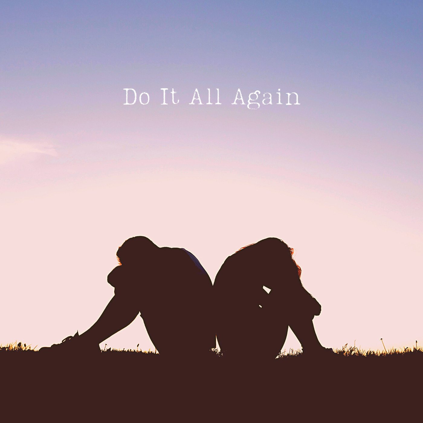 Silhouette of a couple sitting back-to-back on grass at sunset with the phrase "Do It All Again" in white text at the top.