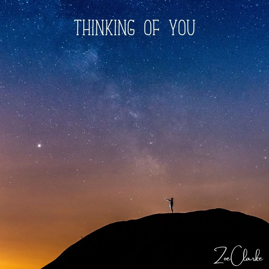 A person standing on a hill at night, pointing towards a starry sky with the text "Thinking of You" at the top and the name "Zoe Clarke" at the bottom.