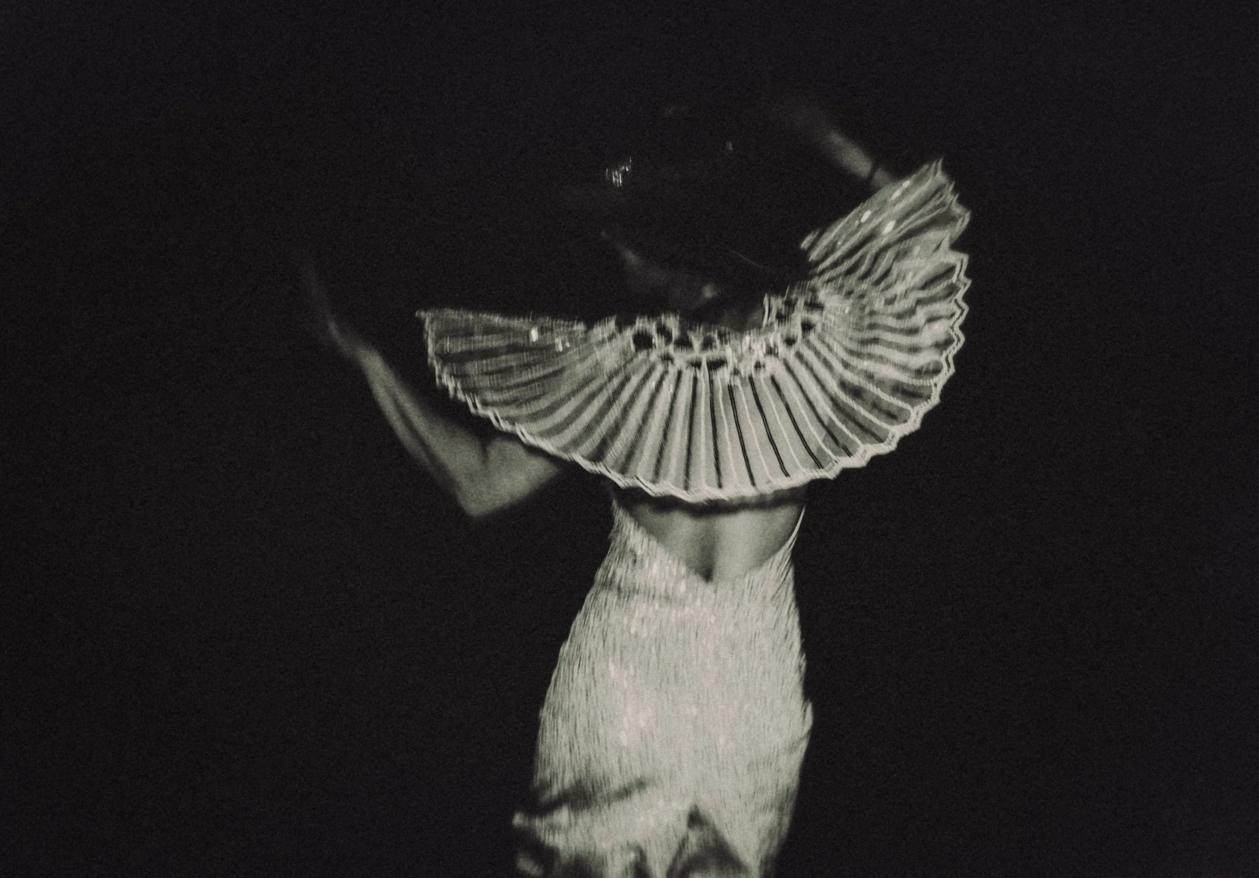 Monochrome photograph of a dancer holding a fan – Suteishi