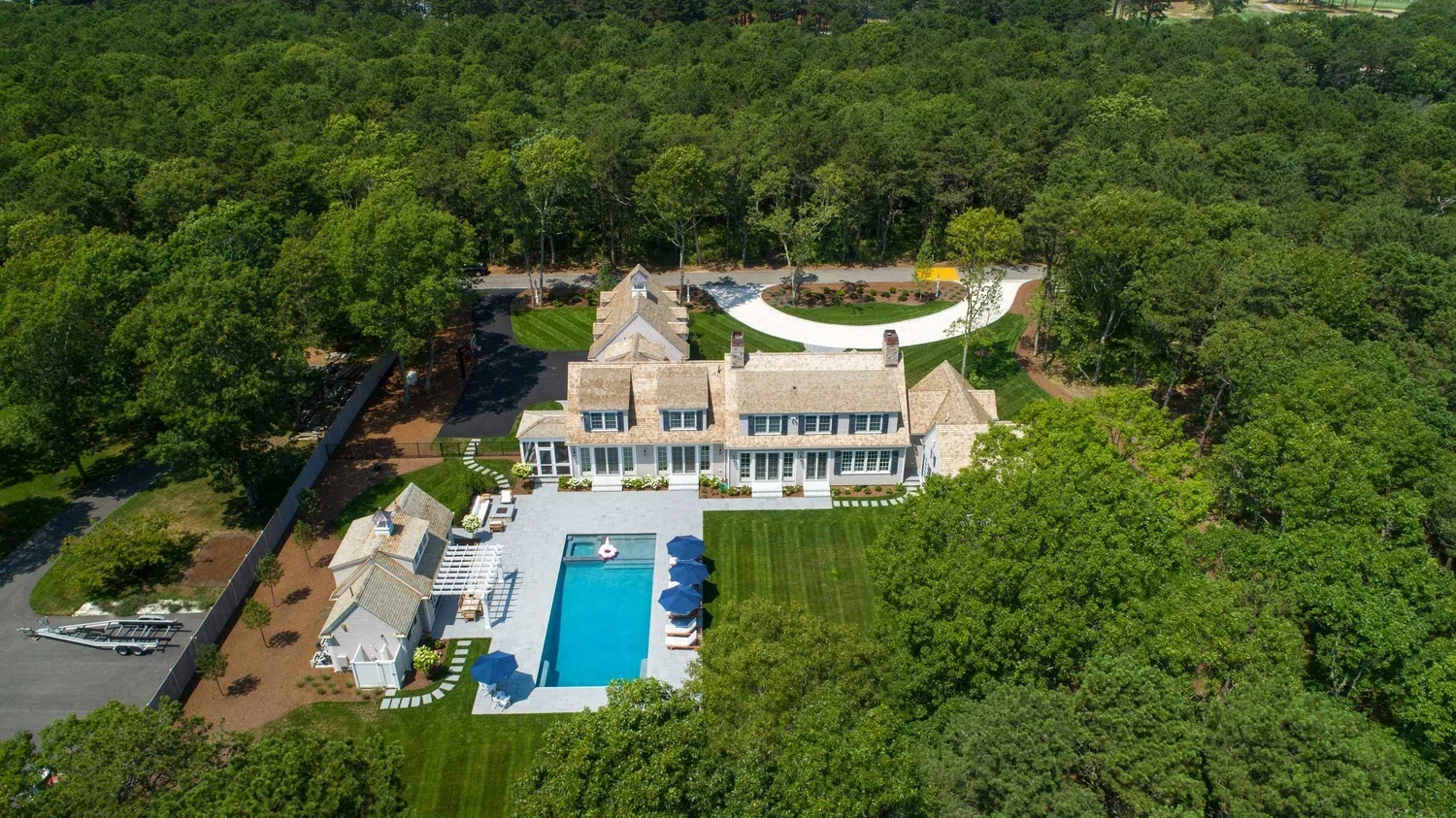 james-golden-oyster-harbors-family-compound-aerial-pool-cabana-outdoor-shower-swimming-pool--pergola-back-yard-master-suite.webp