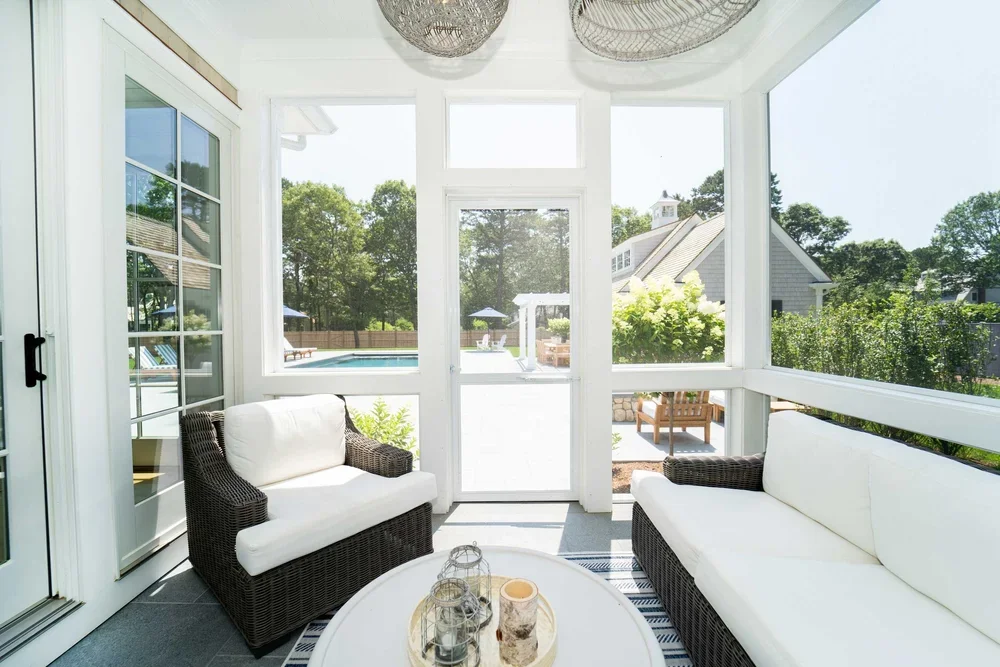 james-golden-oyster-harbors-family-compound-screened-porch.webp