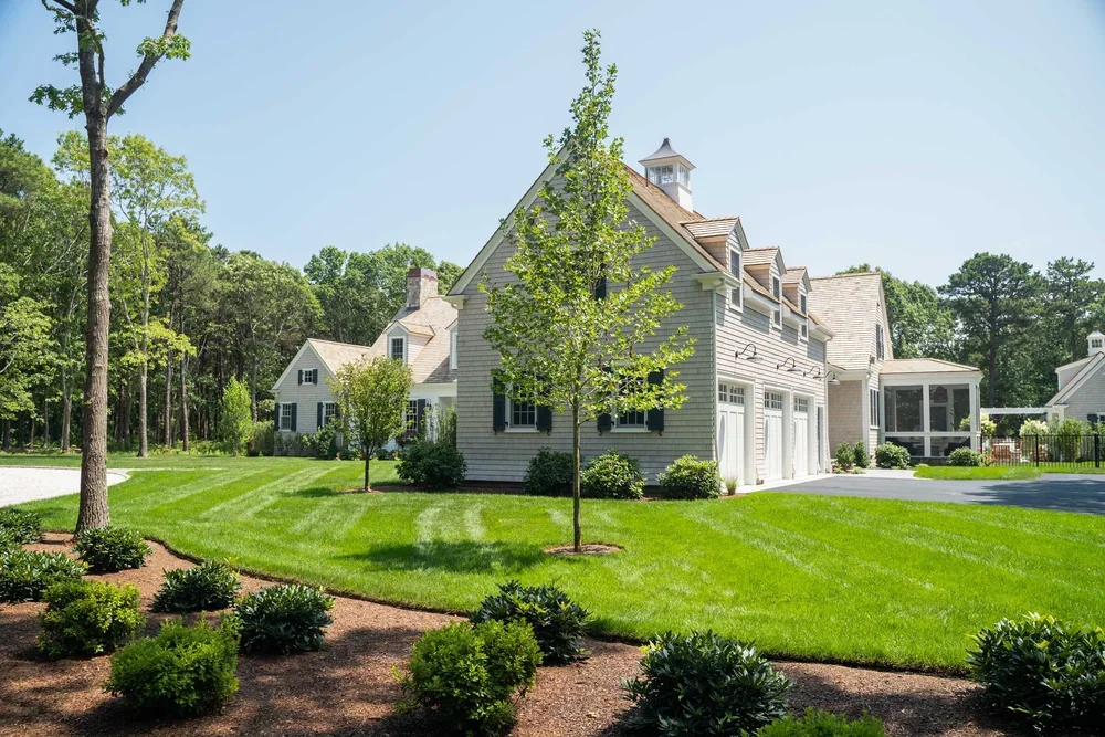 james-golden-oyster-harbors-family-compound-garage-driveway.webp