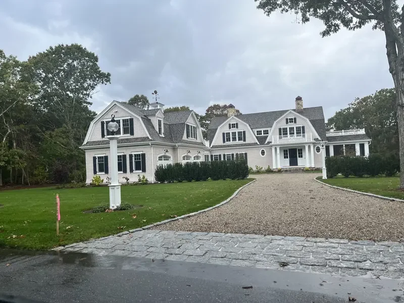 beautiful white house landscape.webp