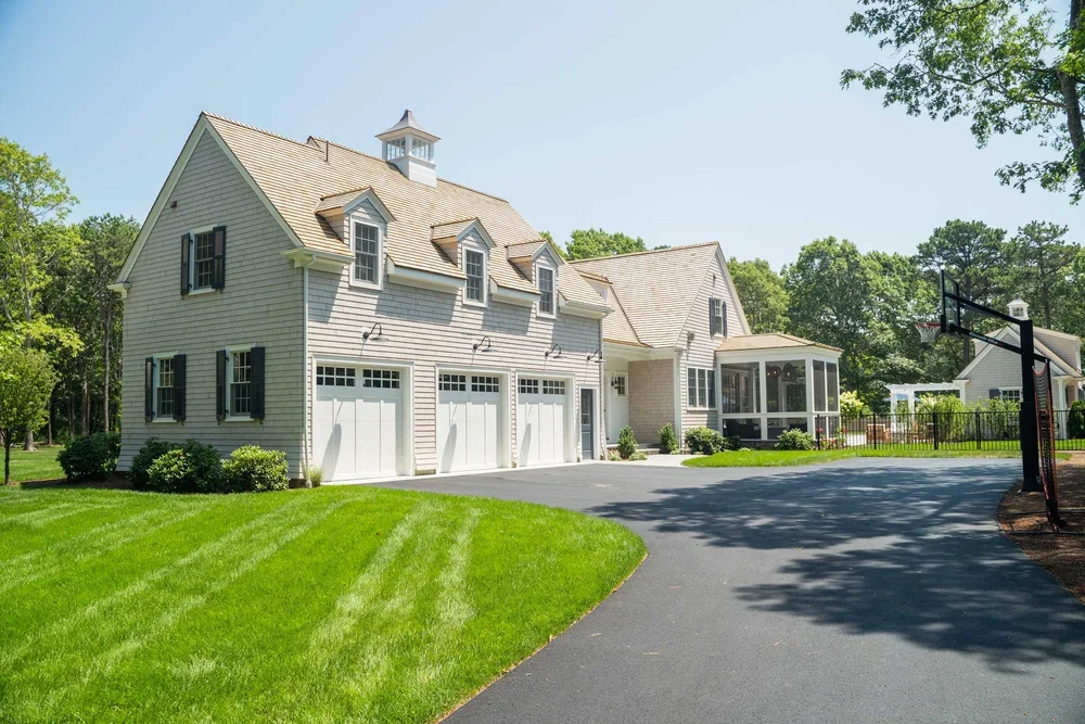 james-golden-oyster-harbors-family-compound-garage-driveway-screened-porch.webp