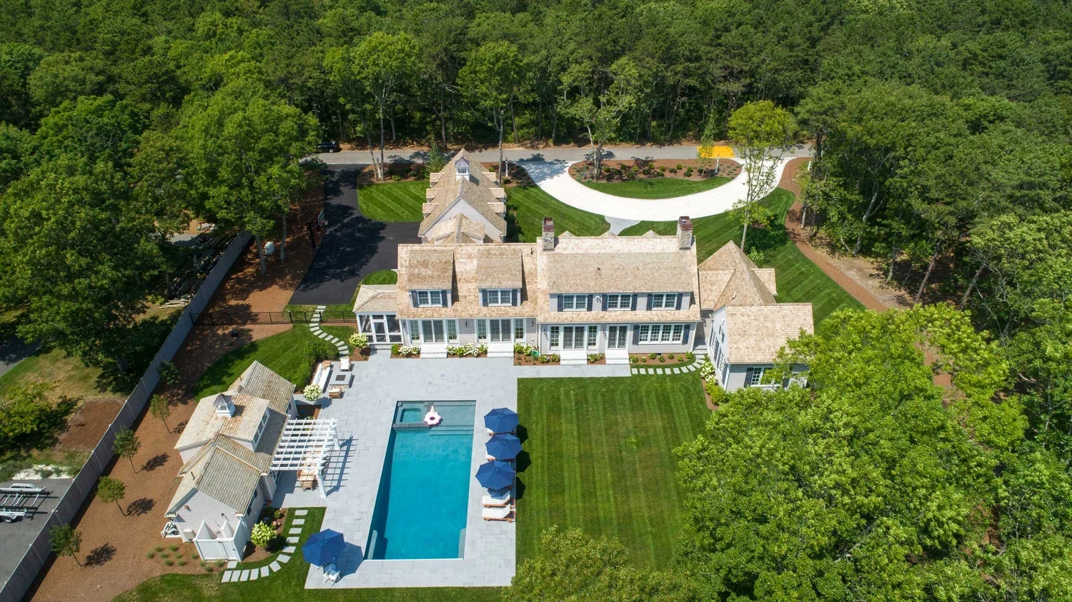 james-golden-oyster-harbors-family-compound-aerial-pool-cabana-outdoor-shower-swimming-pool-back-yard-master-suite.webp