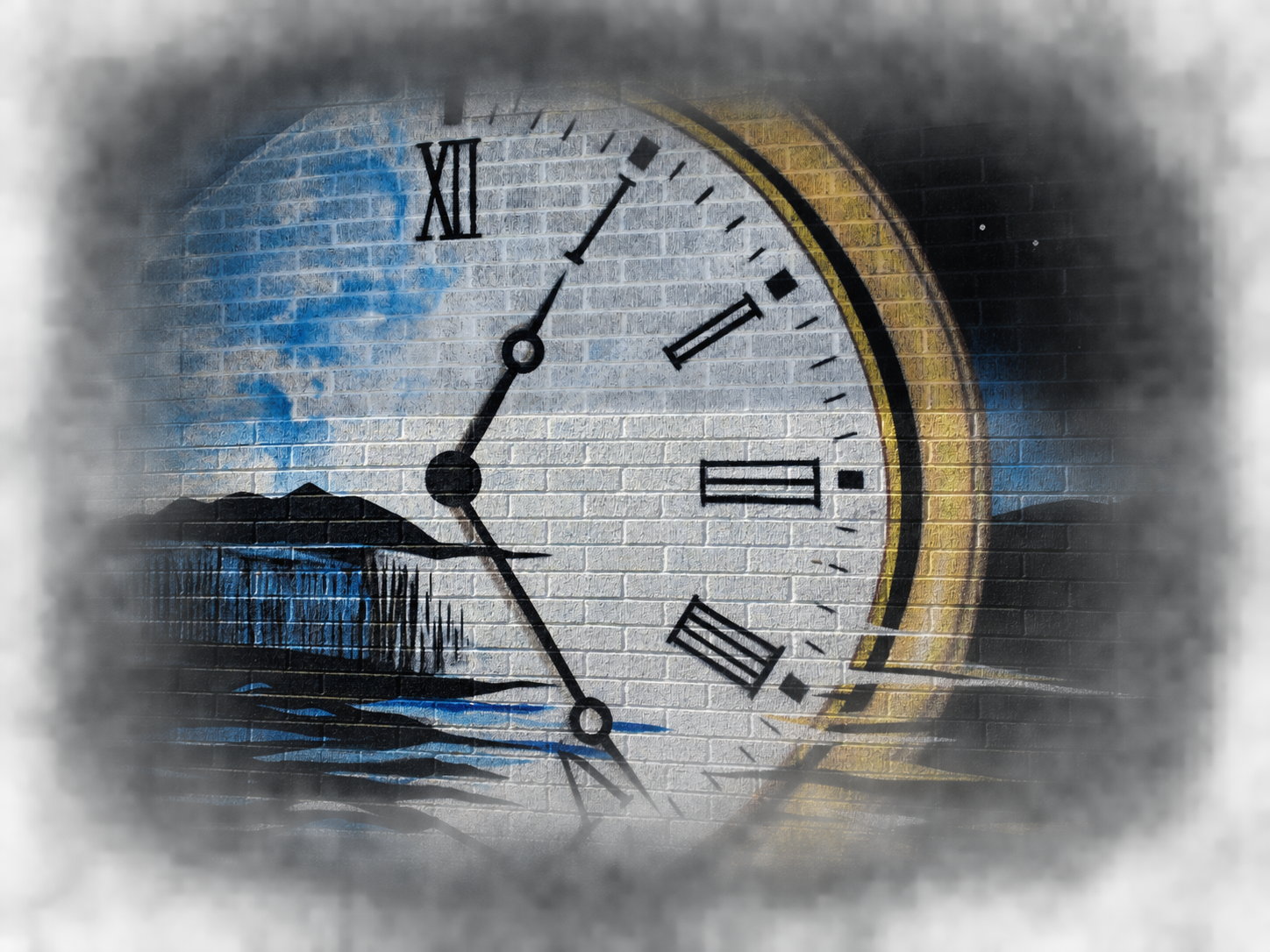 Murals of a clock face and a landscape with mountains and water, painted on a brick wall, illuminated with a spotlight at night.