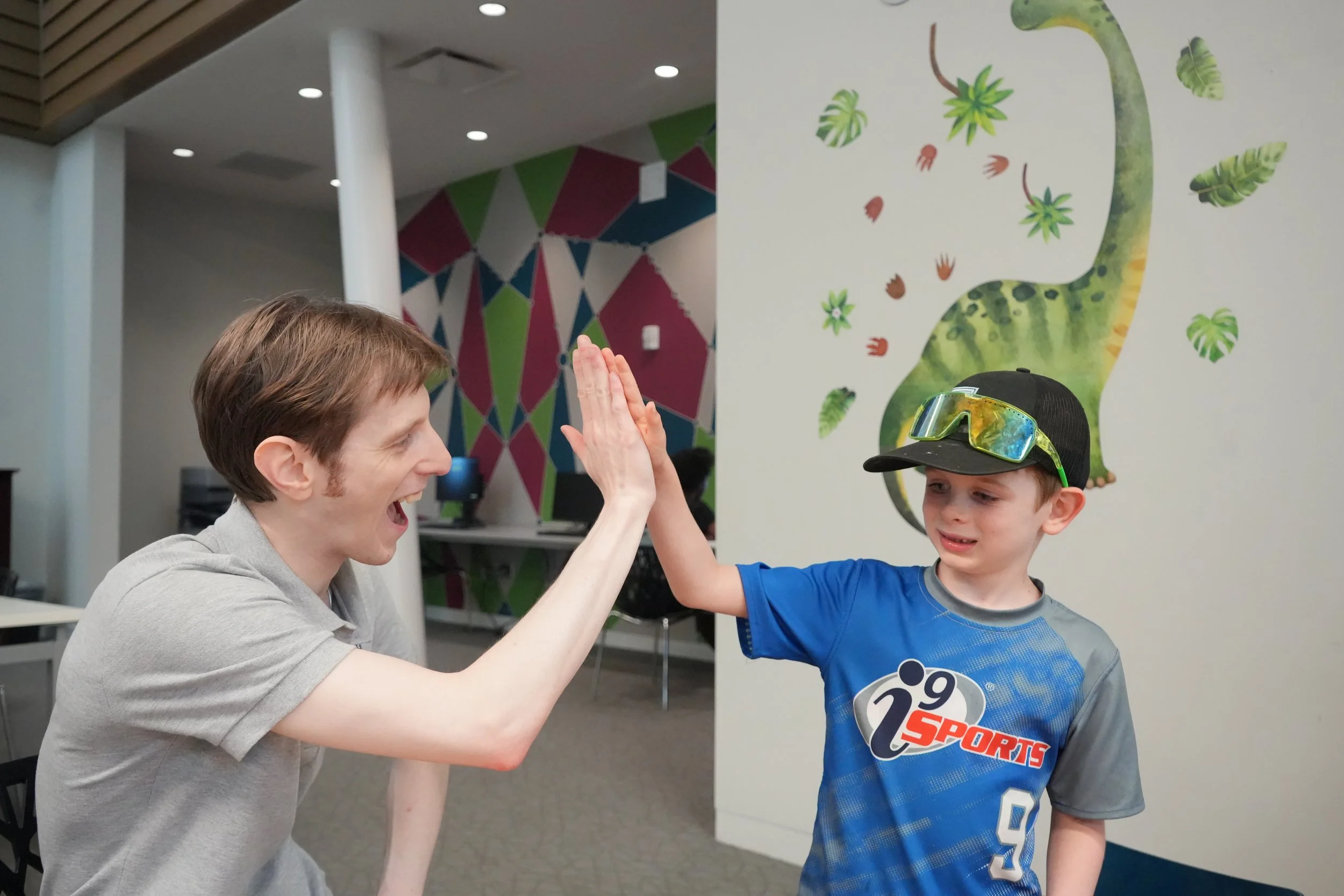 tutor high five student happy teaching that learning can be fun tutoring for all abilities disabilities welcome