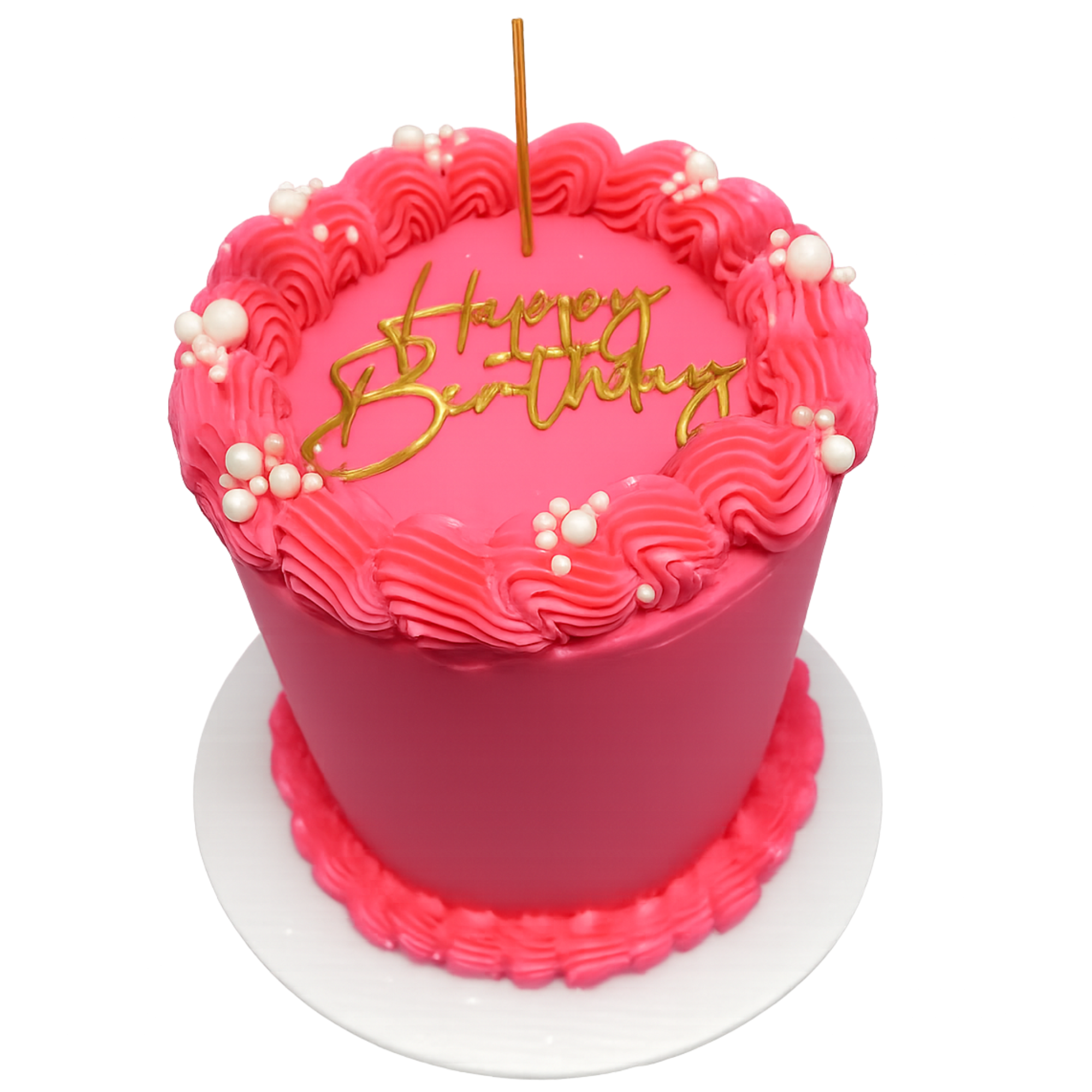 Pink birthday cake with pink icing, white edible pearls, and yellow gold writing that says 'Happy Birthday'. A gold candle is planted in the center of the cake.