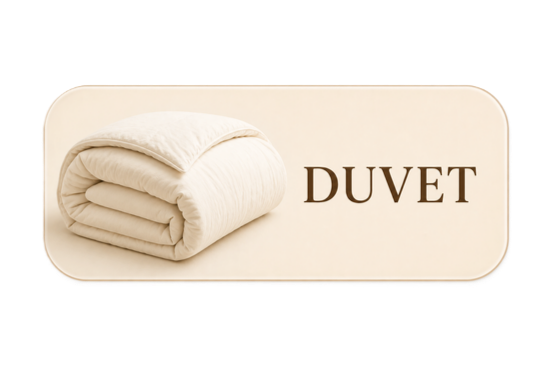 A folded ivory duvet on a light background with the word 'DUVET' written beside it.
