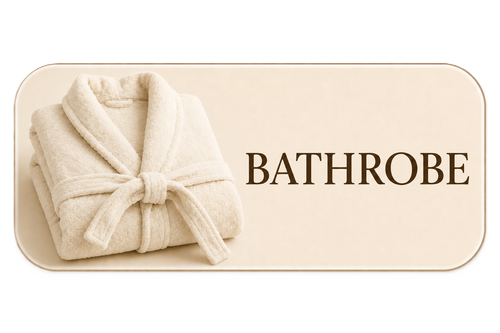 A folded beige bathrobe on a tray with the word 'BATHROBE' written next to it.