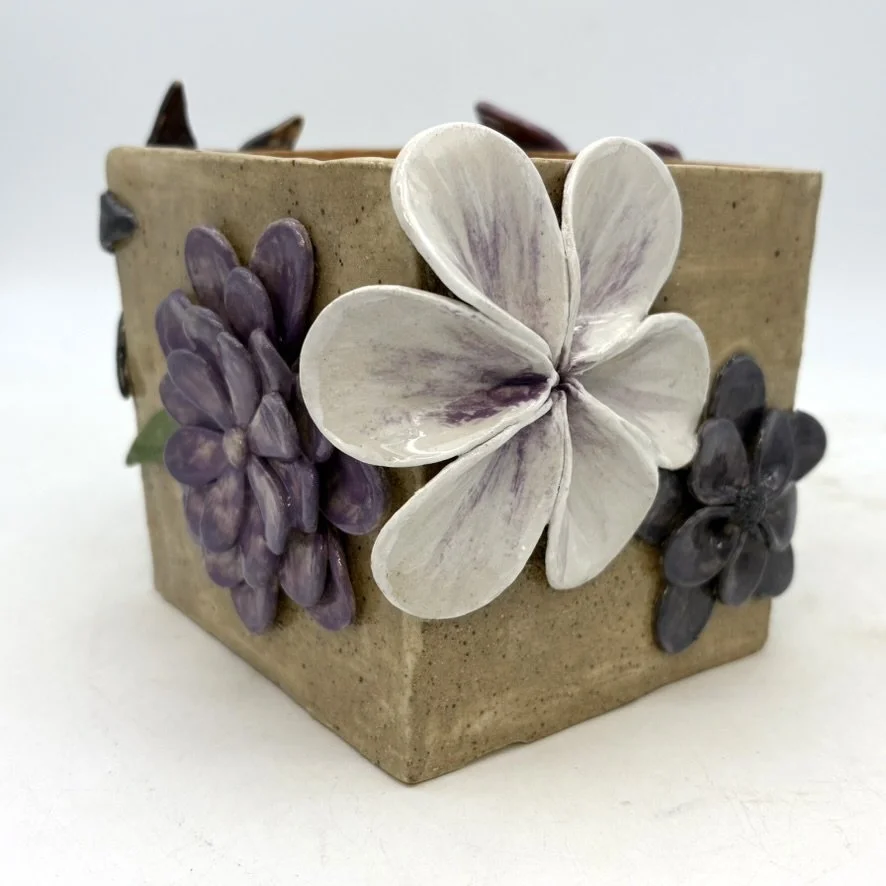 Small (5"x5"x5") purple box. $350