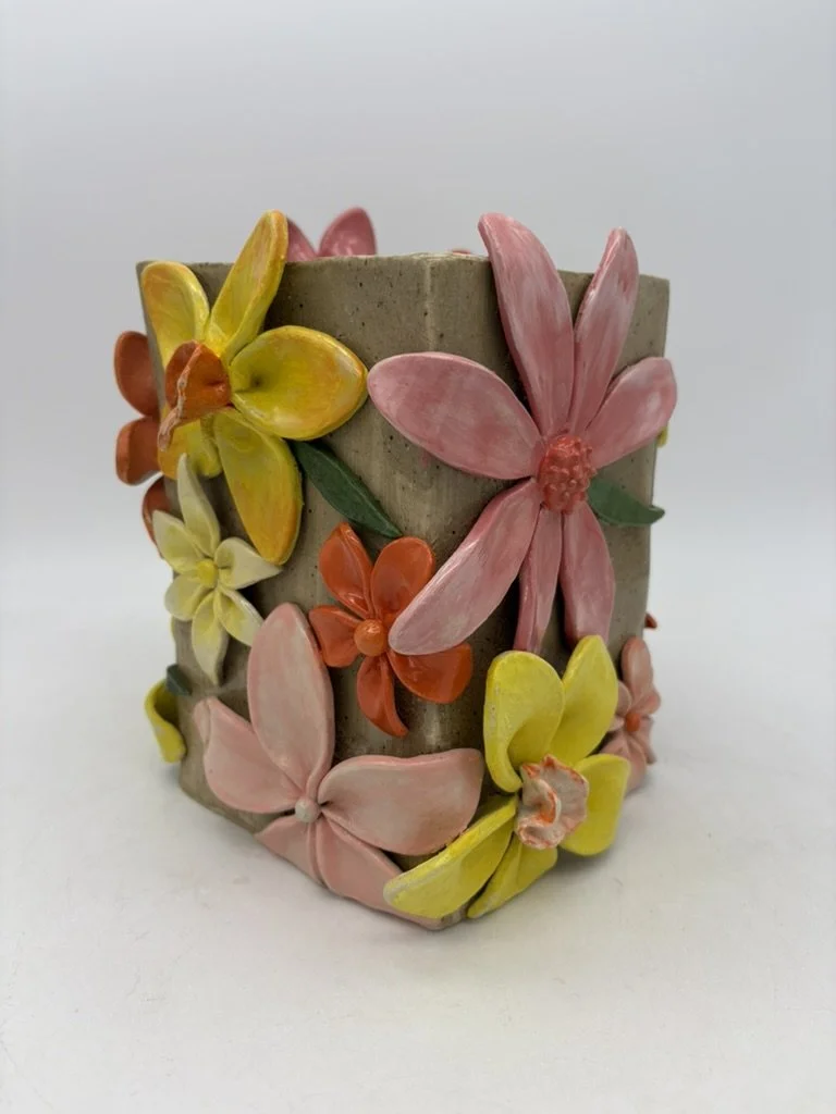 Tall (7.5" x 5.5" x5.5") multicolored box. $500