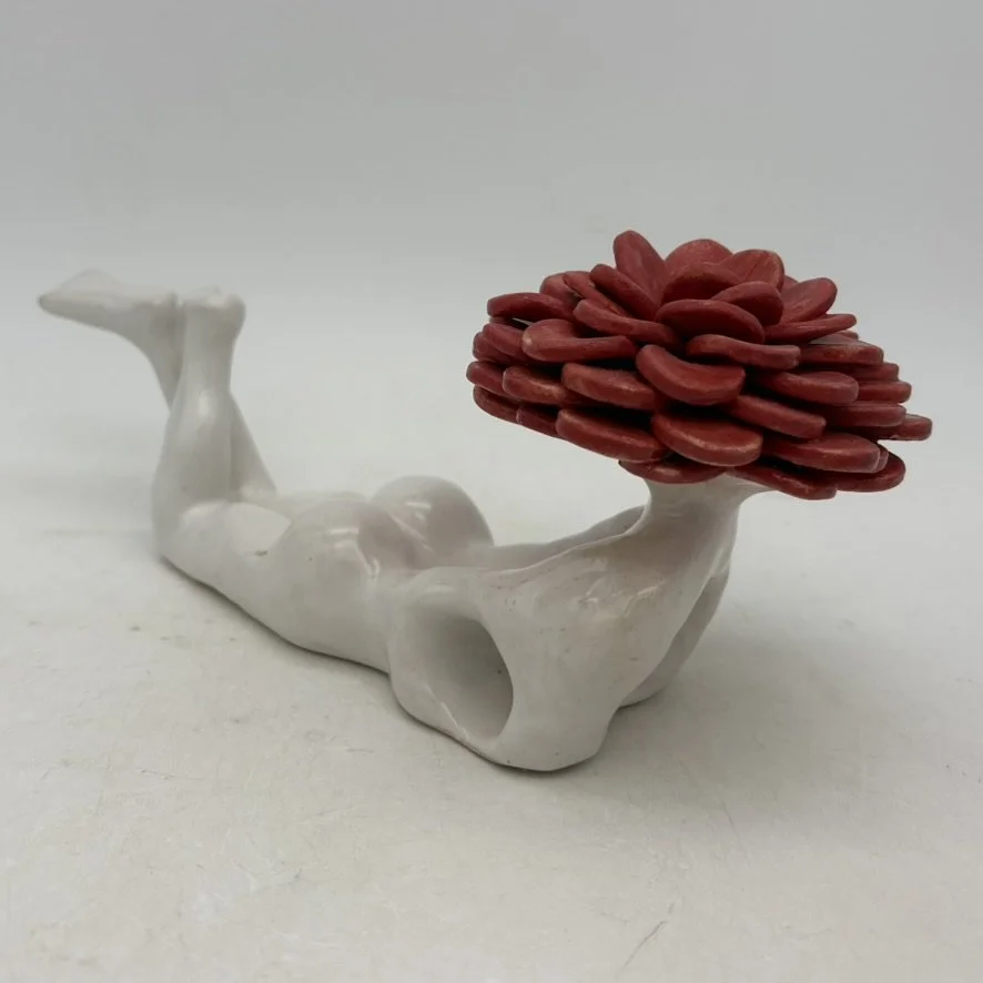 Red flower head. $300