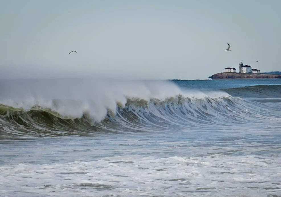 Ocean waves breaking along the Rhode Island coastline near Misquamicut Beach.