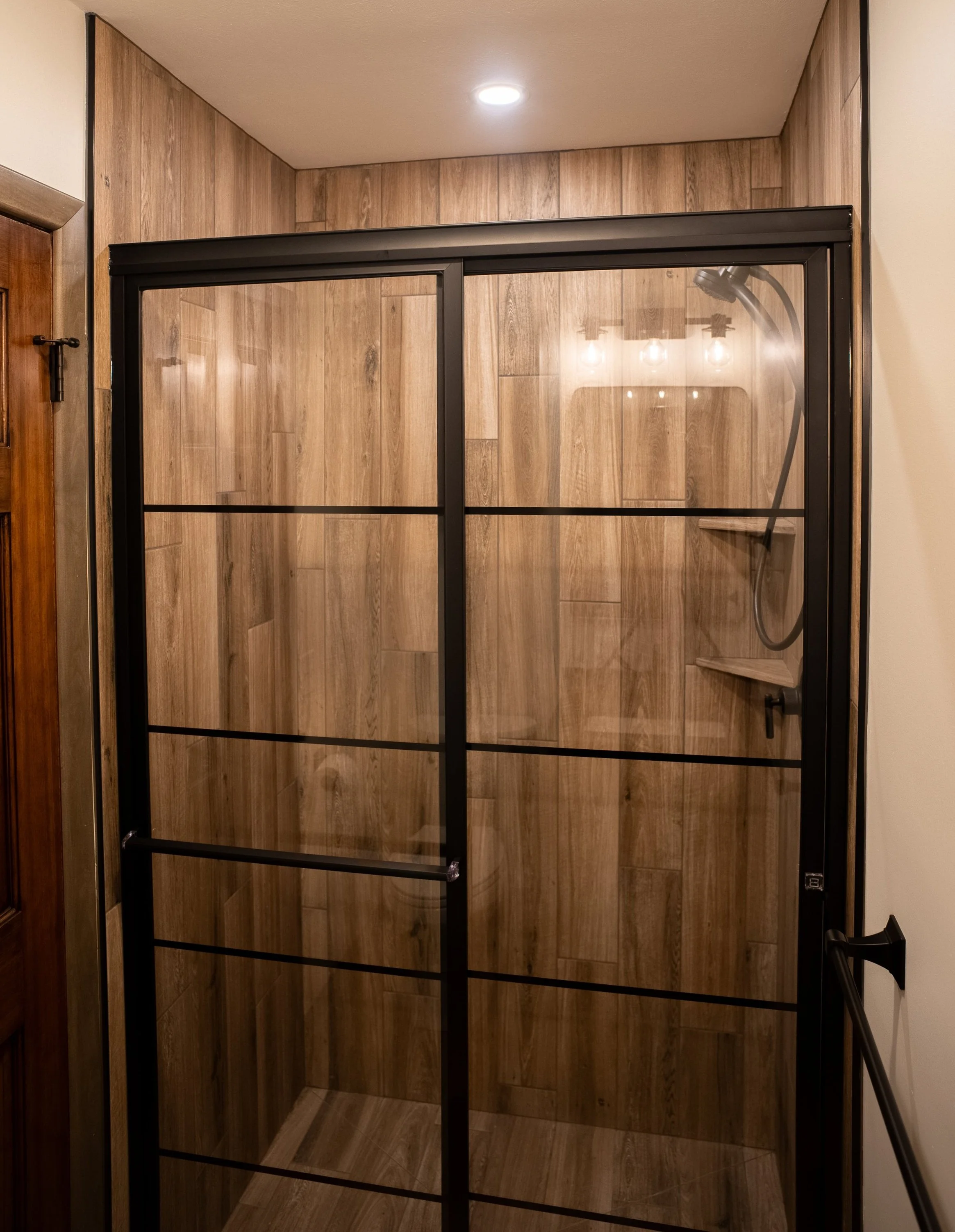 Modern Bathroom 
Wood Shower 
Construction 
Modern Design 
Kansas Construction 
Design and Construction 