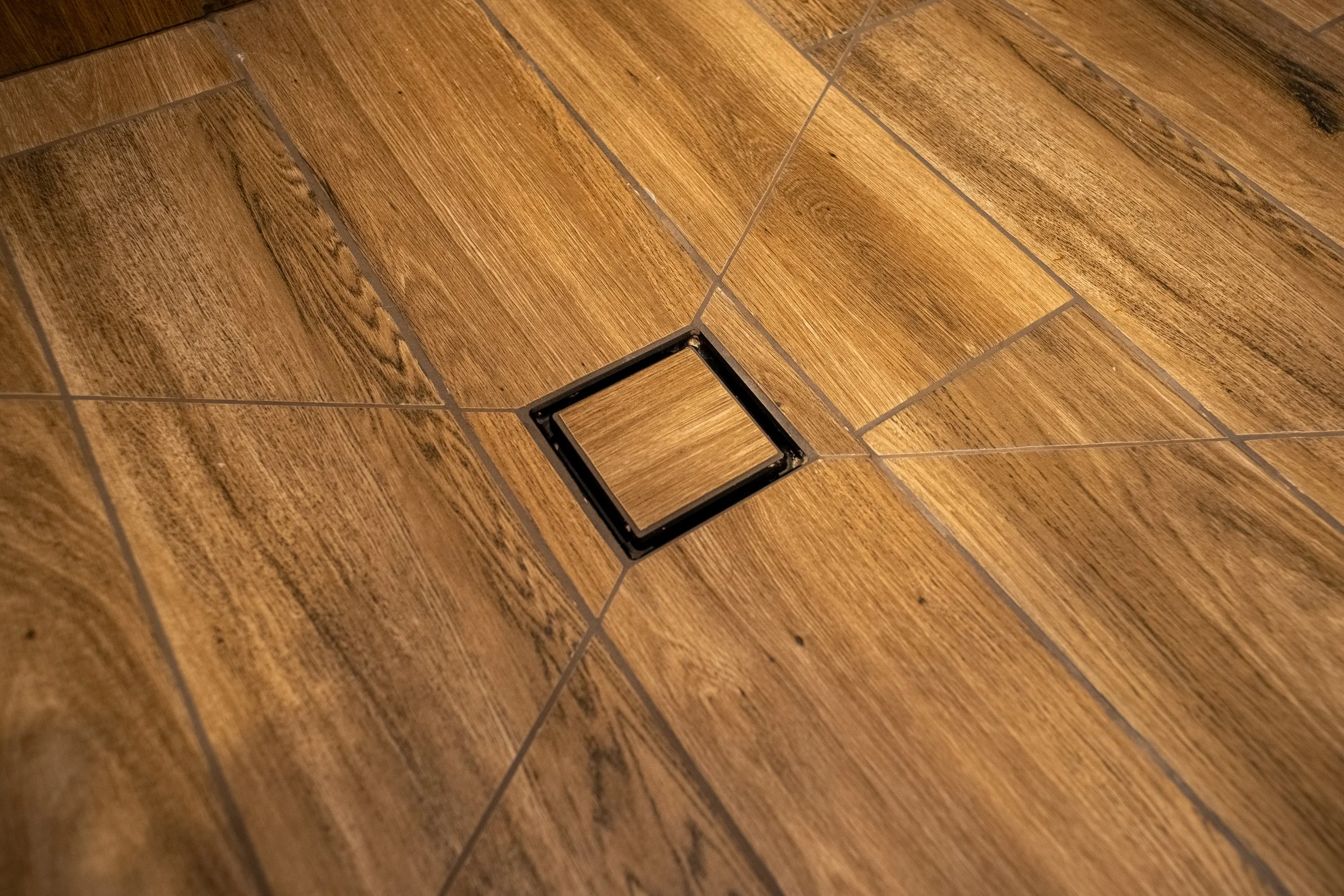 Modern Bathroom 
Construction 
Modern Design 
Wood Tile 
Kansas Construction 
Design and Construction 
