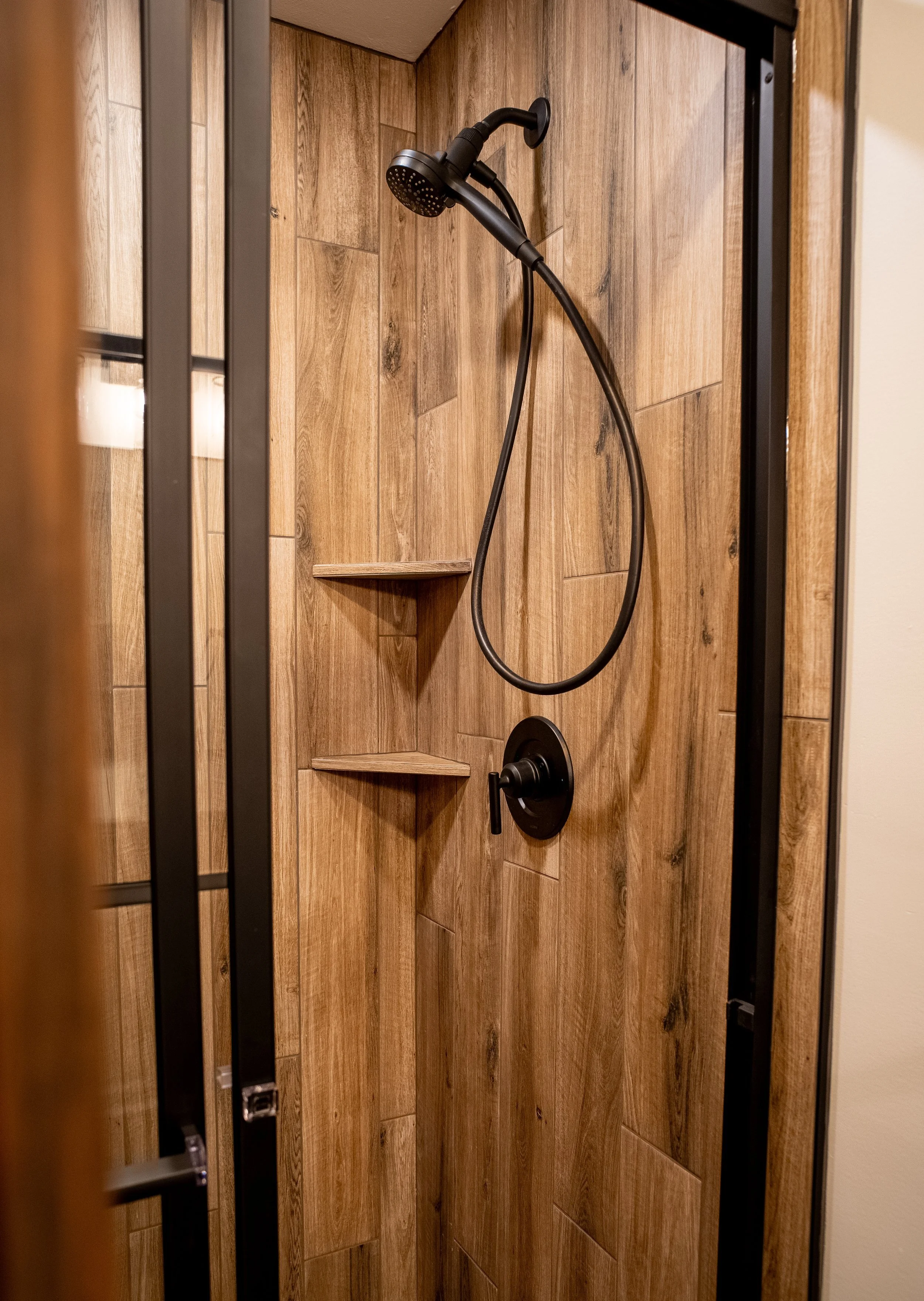 Modern Bathroom 
Construction 
Wood Shower 
Modern Design 
Kansas Construction 
Design and Construction 