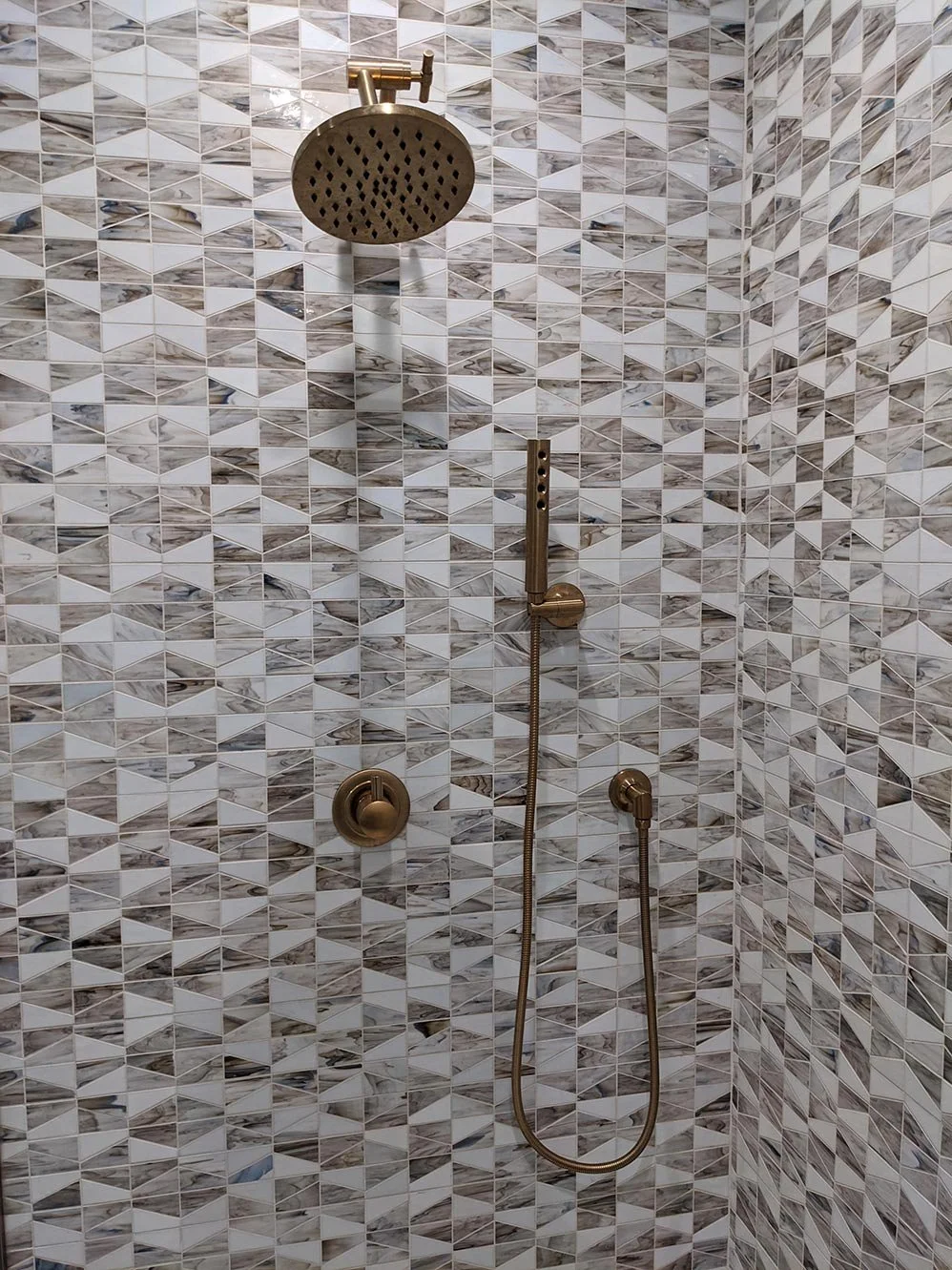 Modern Bathroom 
Construction 
Modern Design 
Grey Shower 
Kansas Construction 
Design and Construction 