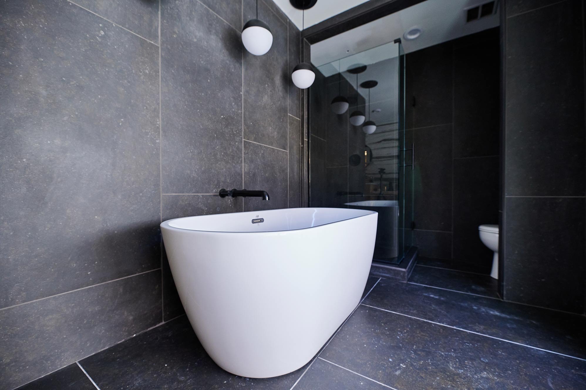 Modern Bathroom 
Black Bathroom 
Construction 
Modern Design 
Kansas Construction 
Design and Construction 