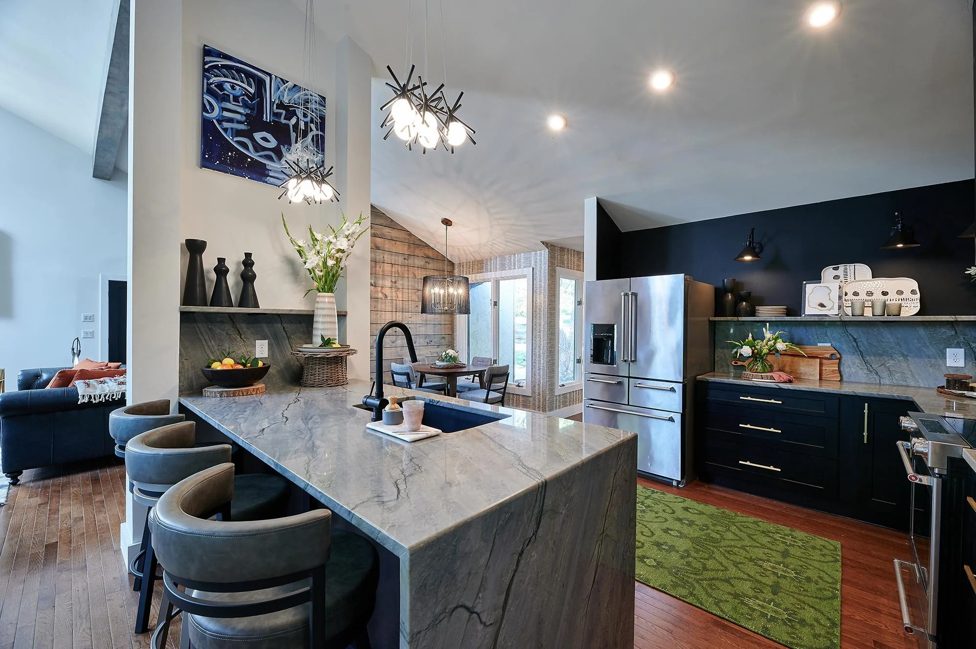 Black and Gold Kitchen 
Marble Kitchen Island 
Open Kitchen 
Modern Kitchen 
Construction 
Modern Design 
Kansas Construction 
Design and Construction 