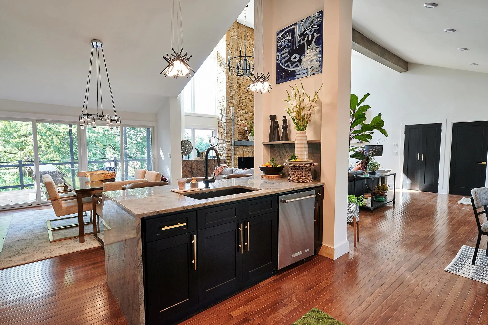 Modern Kitchen 
Construction 
Modern Design 
Kansas Construction 
Design and Construction 
Open Kitchen Design 
Black and Gold Kitchen 