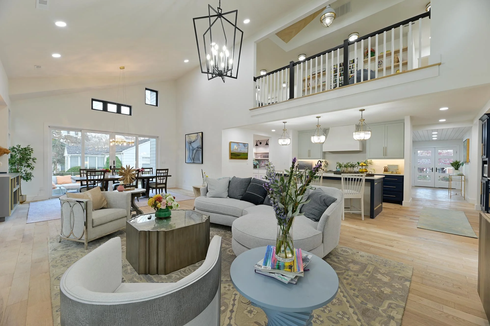 Modern Living Room 
High Ceiling Living Room 
Open Living Room 
White Living Room 
Elegant Living Room 
Construction 
Modern Design 
Kansas Construction 
Design and Construction