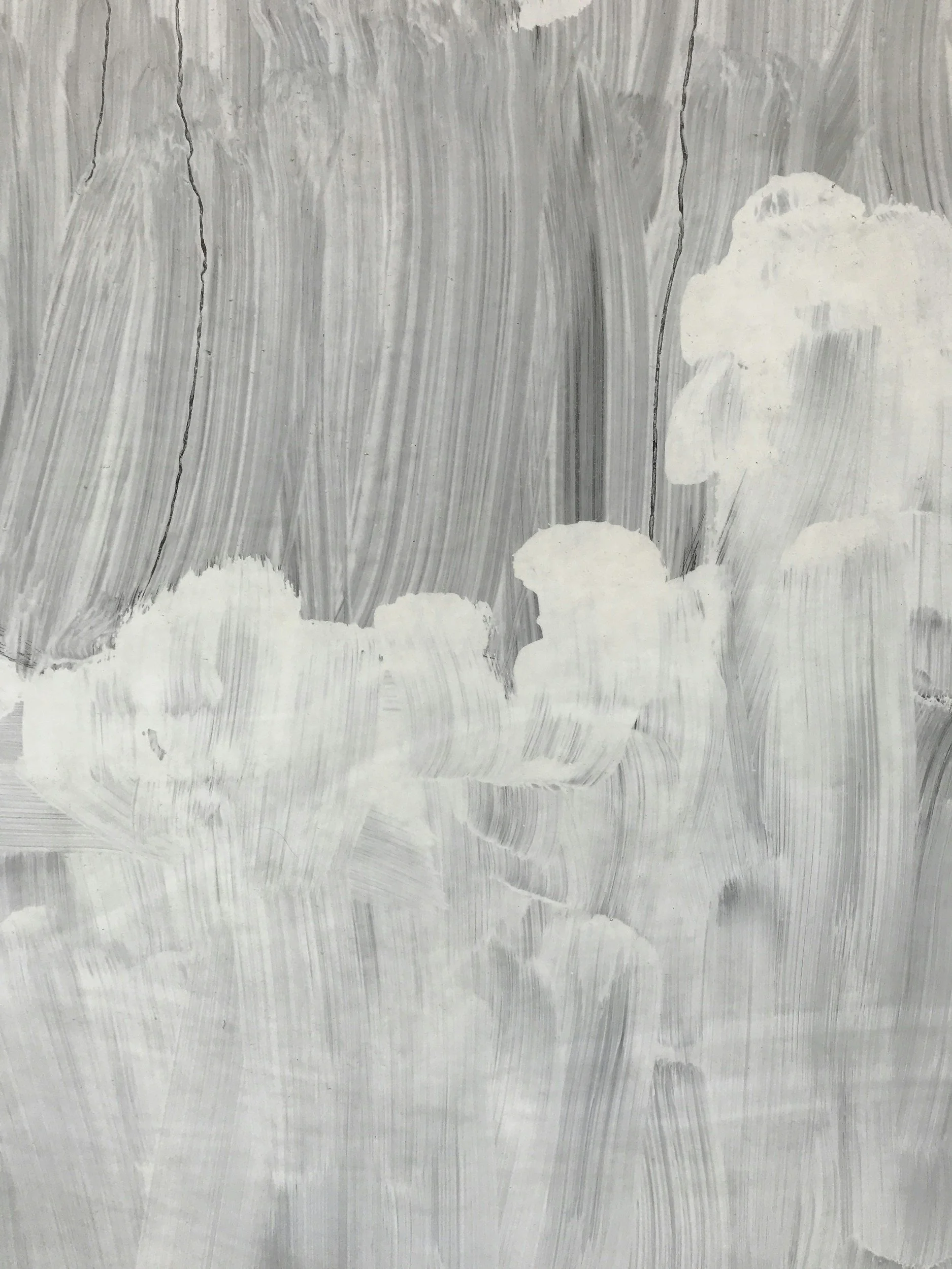 Close-up of a frosted glass window with water streaks and partial snow or ice accumulation on the bottom edge.