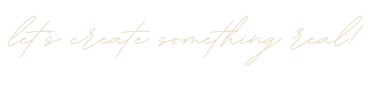 Inspirational quote in cursive font saying "let's create something real!"