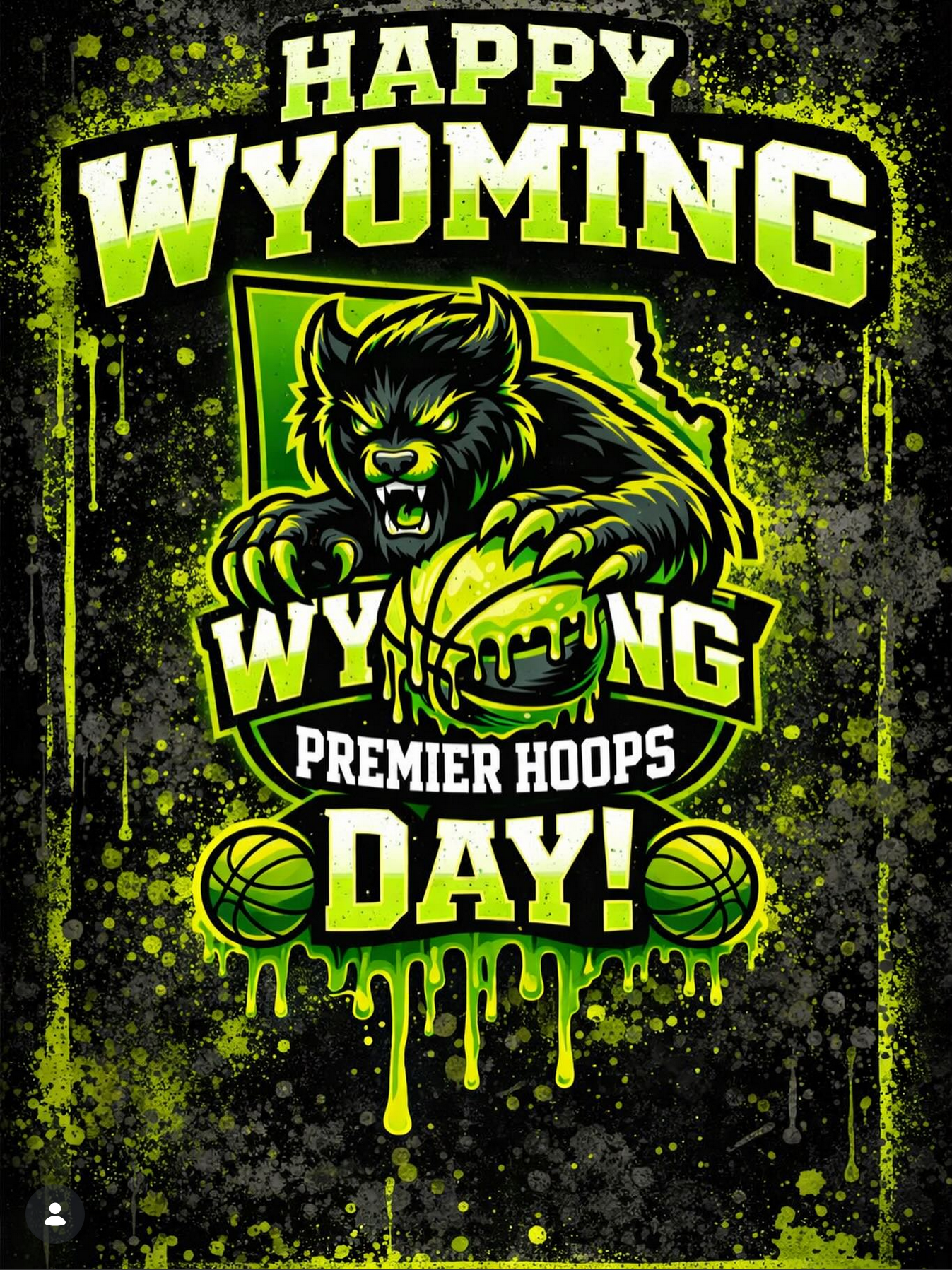 A graphic celebrating Wyoming's Premier Hoops Day with a fierce lion mascot holding a basketball, surrounded by green and black splatter effects, bold text saying "Happy Wyoming Wyoning Day!"