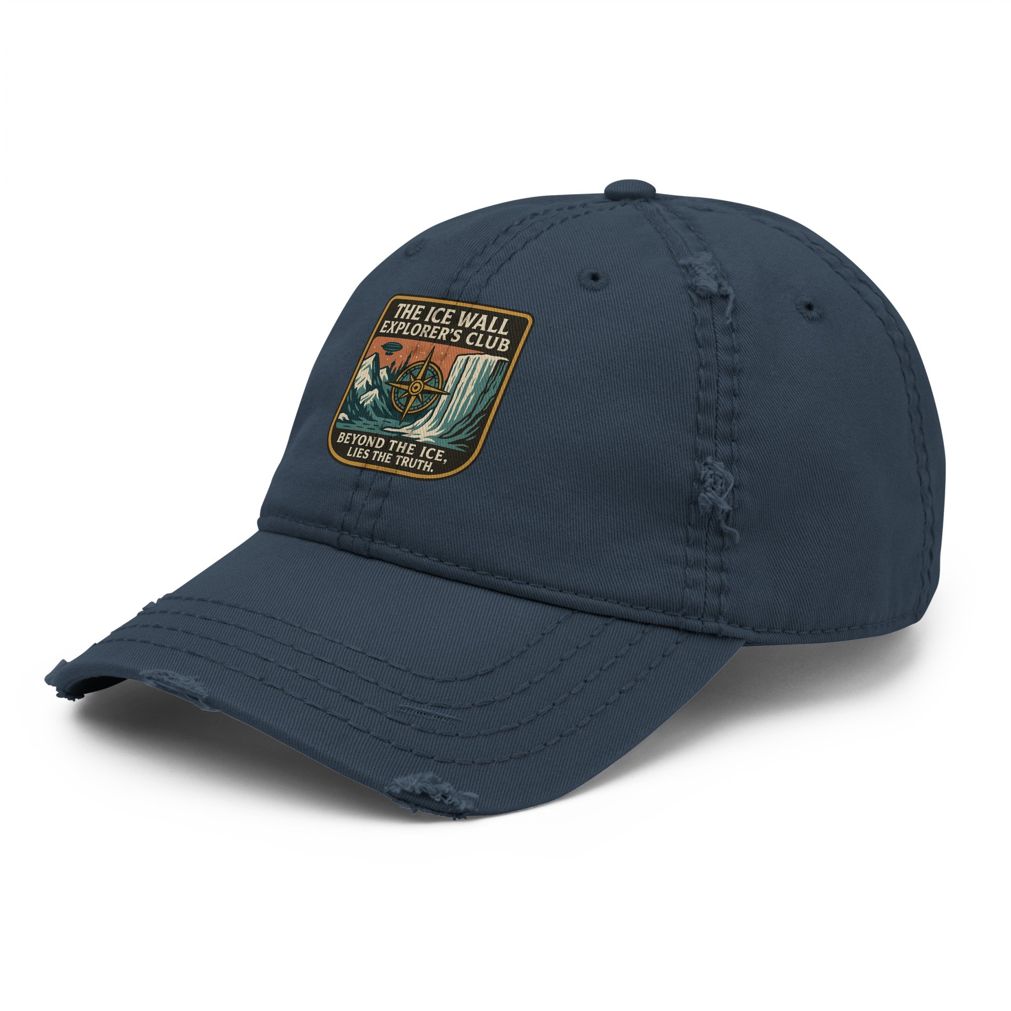 Hat — Close-up embroidered patch detail showing ice wall, celestial compass, and Tartarian spires — Hidden history — Etherfol