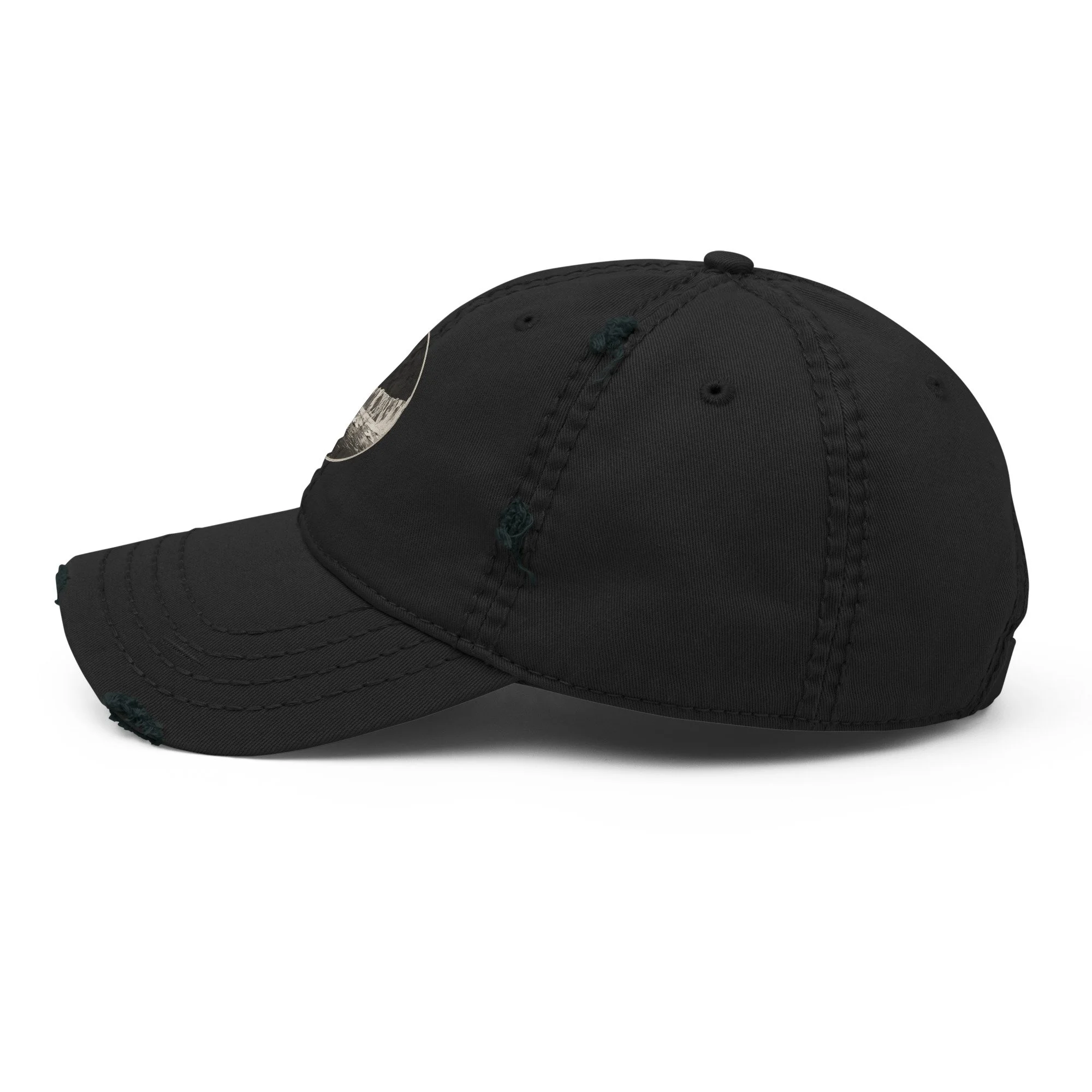 Dad hat showing distressed side profile with ice wall circular emblem and worn brim detail — hidden history — Etherfolk