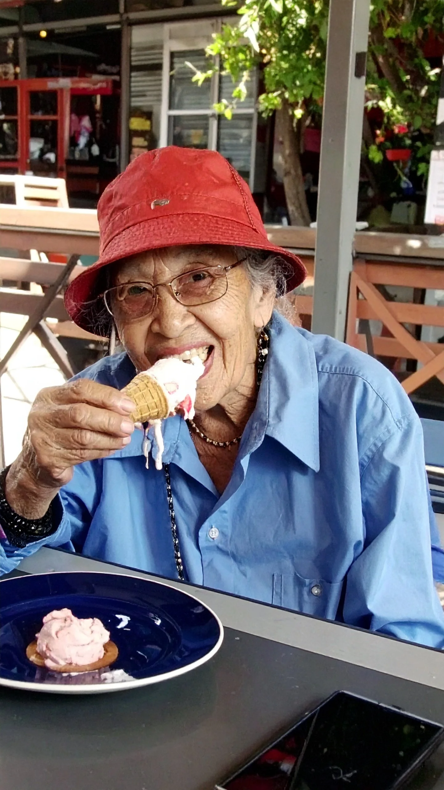 Firefly_Cool grandma eating an ice cream melting 384726.jpg