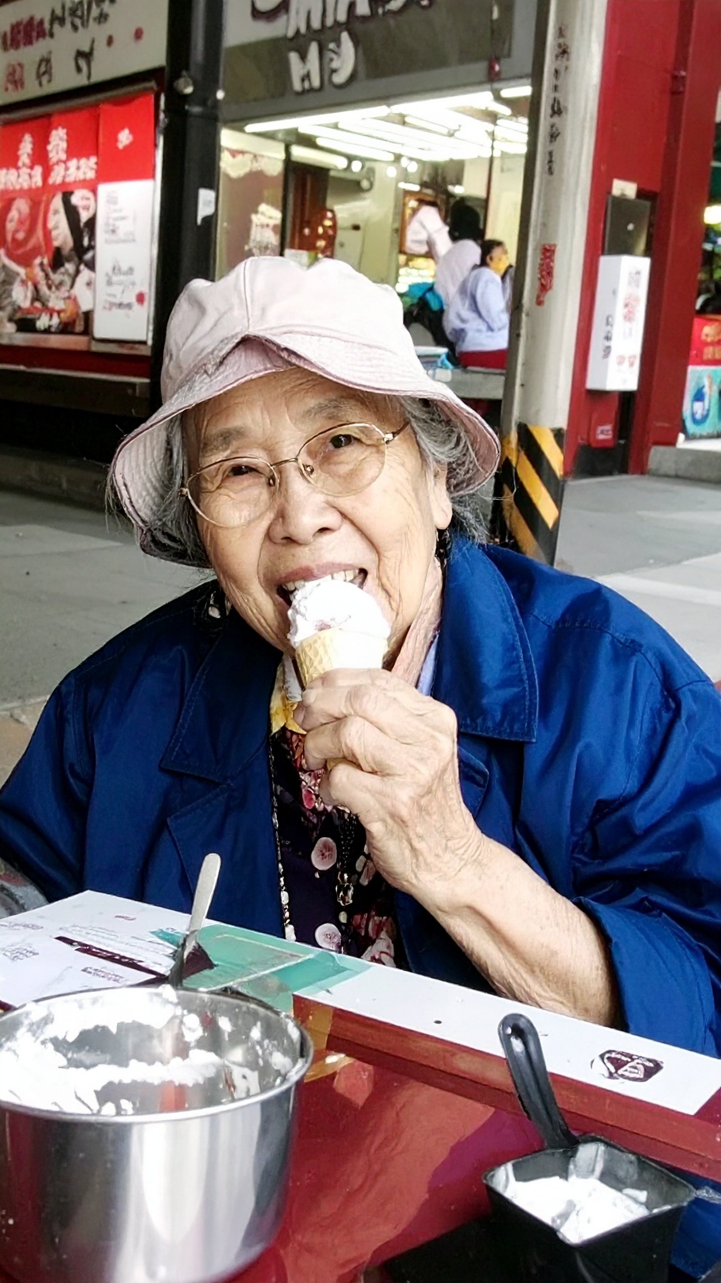 Firefly_Cool grandma eating an ice cream melting 868202.jpg
