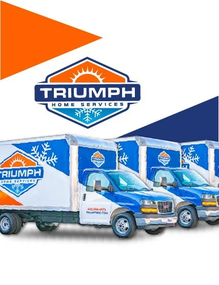 Image of three trucks with Triumph Home Services branding, parked in front of a large Triumph logo with orange and blue design elements in the background.