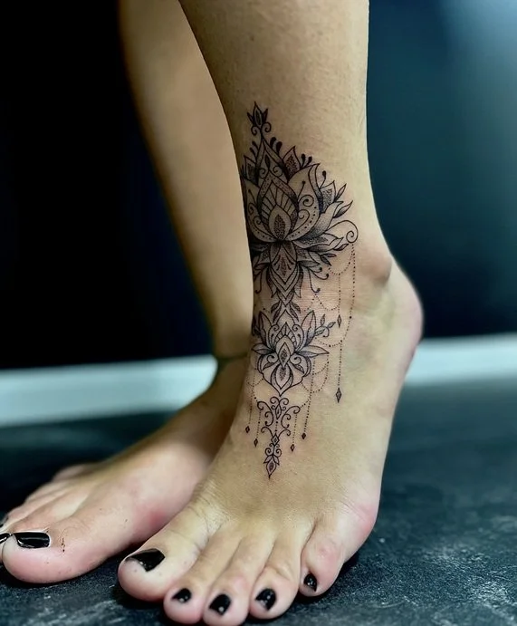 delicate ornamental ankle tattoo