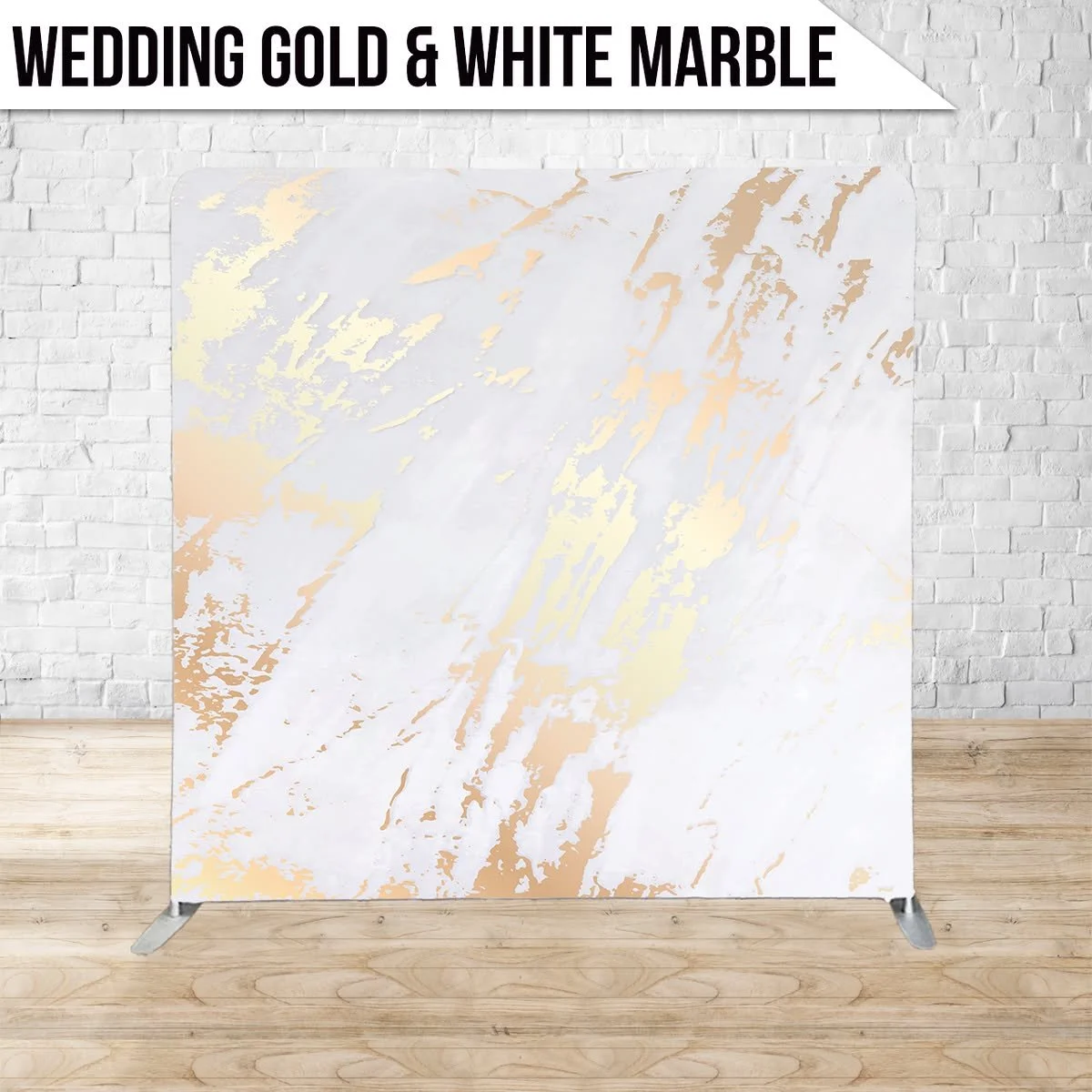 Marble backdrop with white and gold pattern, on a stand against a white brick wall