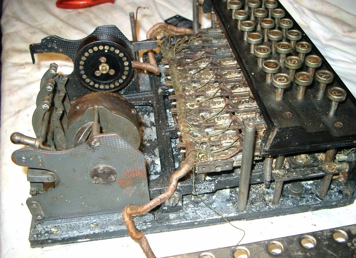 An old, enigma machine before restoration.