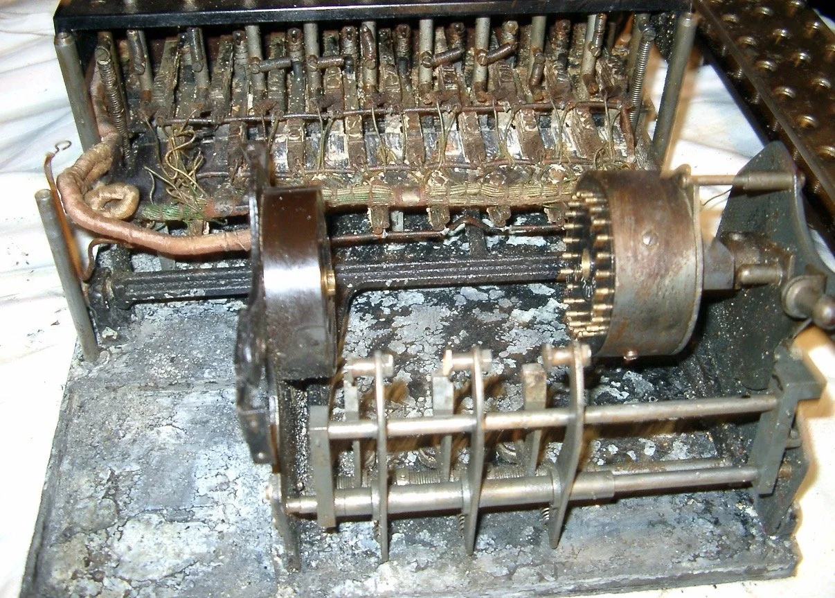 An old, enigma machine before restoration.