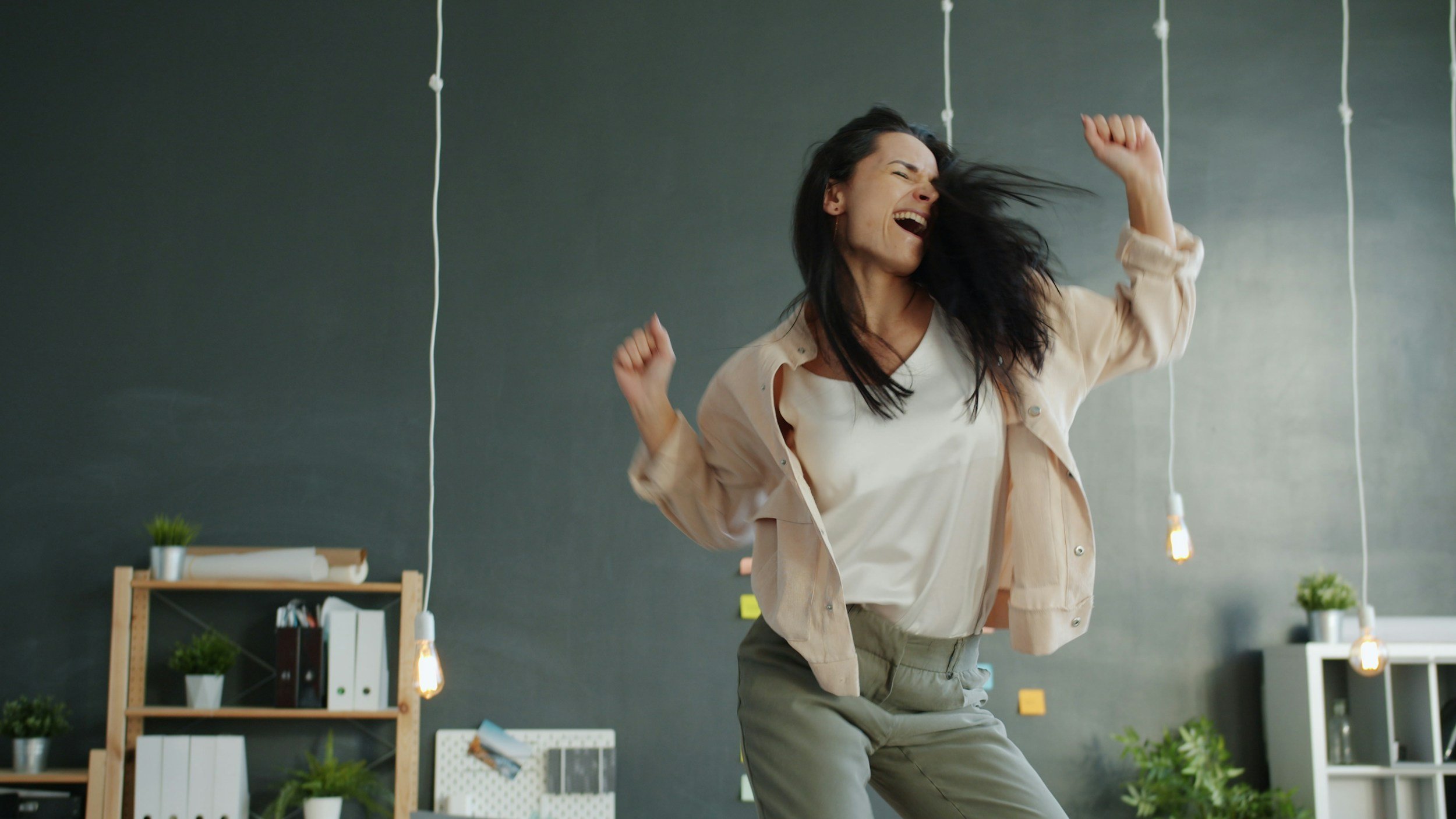 woman dancing, carefree