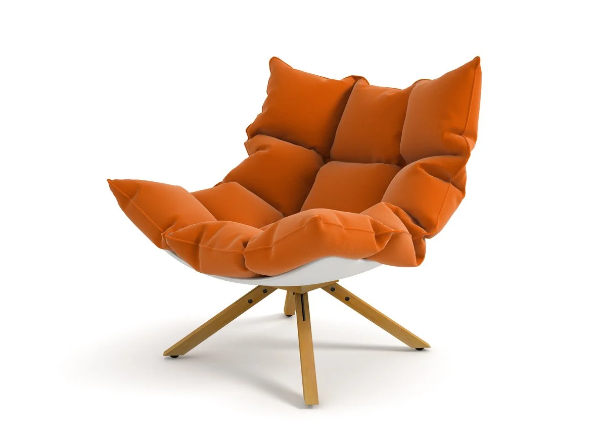 Modern orange cushioned armchair with wooden legs on a white background.