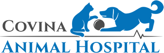 Logo of Covina Animal Hospital featuring a blue dog and cat with a gray paw print