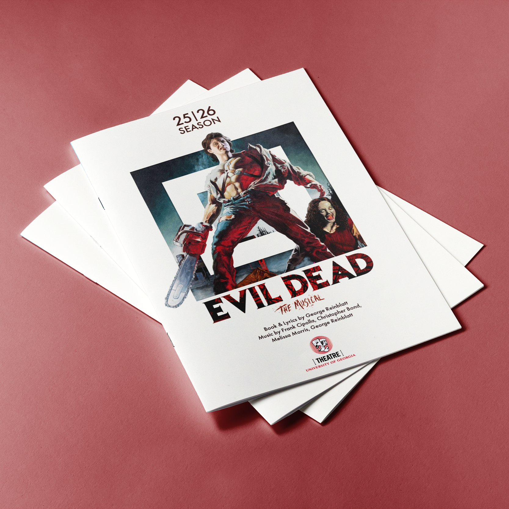 Promotional program booklet for the musical "Evil Dead" at the University of Georgia Theatre, featuring a character holding a chainsaw and a woman with a bloody face on the cover, against a pink background.