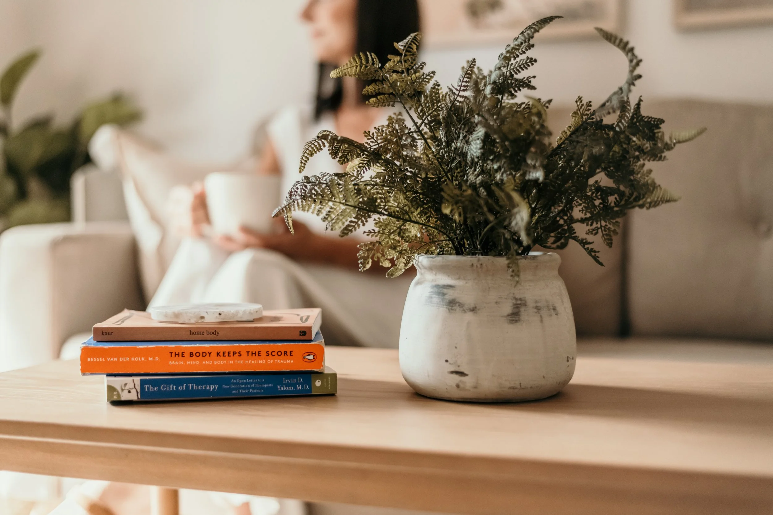 Therapy books in therapy office. In-person therapy