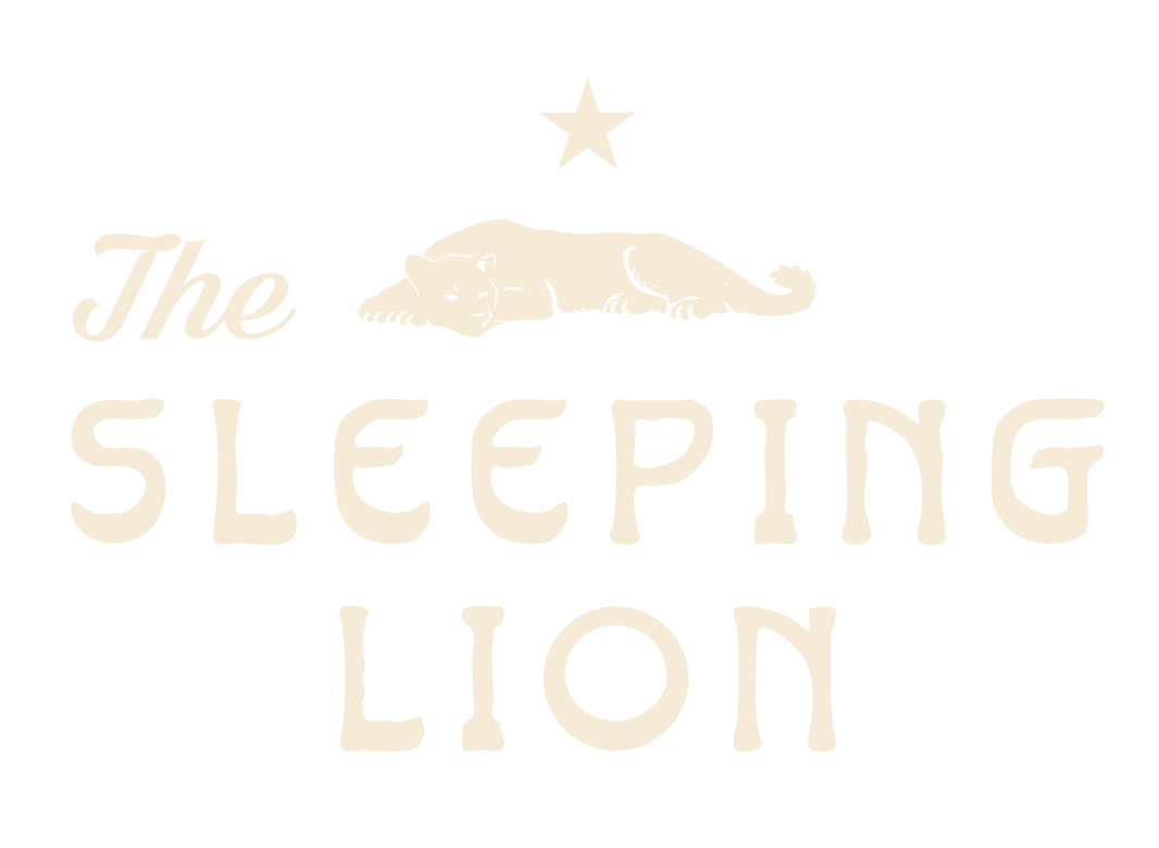 The Sleeping Lion Restaurant in Fort Davis Primary Logo